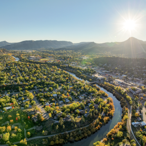 drone shot of a river running through downtown in Durango Colorado