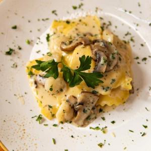 Entree Dish with white sauce and mushrooms