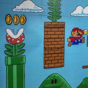 A mural inside of Traveler's Taproom in Greenville, SC depicting the Nintendo game, "Mario Bros."