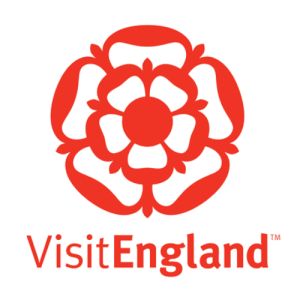 A red logo that reads 'Visit England'