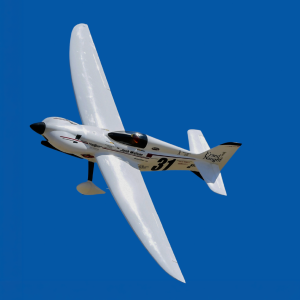 Formula One class racer turning in flight.