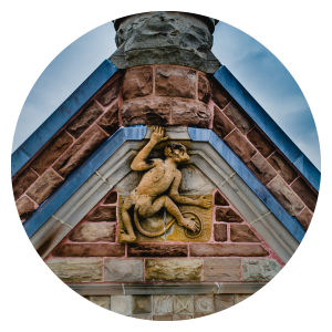 Close-up of Courthouse with stone detail and carved monkey