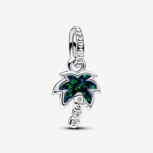 Silver charm pendant featuring a palm tree design with a green and blue opalescent inlay and three small gems on the trunk, set on a plain white background.