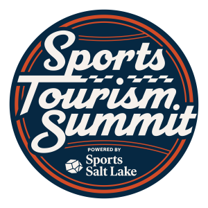 Circle with red accents that make it look like a ball with the words Sports Tourism Summit powered by Sports Salt Lake on it