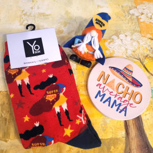 Red Super Mom socks with other small gift items