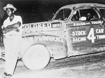 Cave Johnson, Jr. and his stockcar.