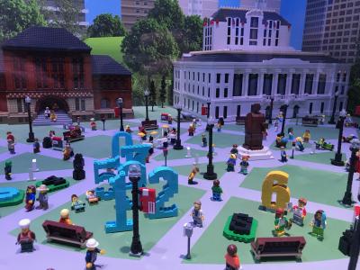 Miniature people and buildings in a city made of Lego bricks inside the LEGOLAND Discovery Center