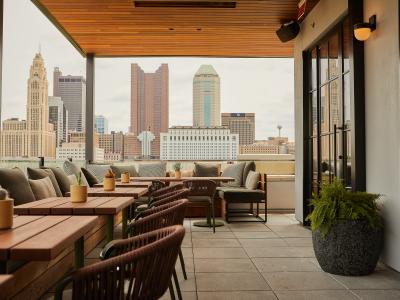 A view of the Columbus skyline from The Brass Eye, a rooftop bar at The Junto