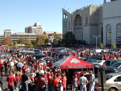 Parking lot outside of Ohio Stadium filled with tailgaters before football game