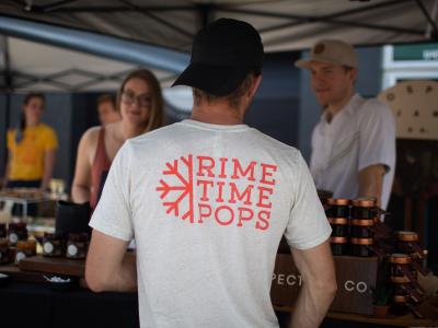 Man in Rime Time Pops shirt