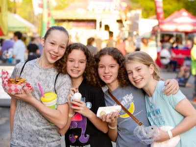 four kids enjoying ice-cream at lemonade days Dunwoody