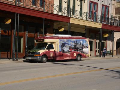 grapevine visitors shuttle parked on main street