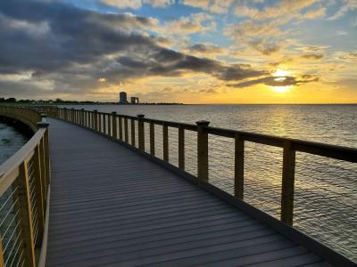 A sunset view from the Bucktown Marsh Boardwalk on Lake Pontchartrain