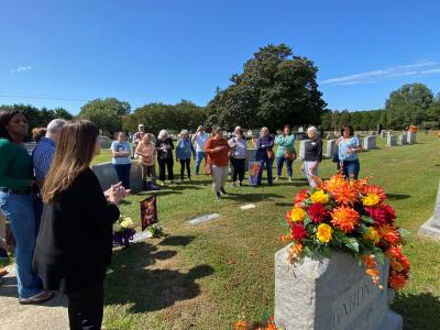 Festival attendees gathered at Ava's grave