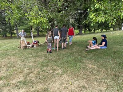People gathered at the Independence Day Celebration at Daniel Boone Homestead.