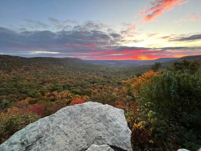 Sunrise at hawk mountain with pinks, blues, and fall foliage