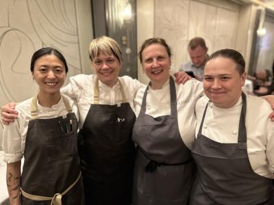 The culinary teams of MICHELIN-starred chefs Andrea Carlson (second from left) and Angela Hartnett (second from right) engaged in a Q&A discussion with attendees throughout the evening