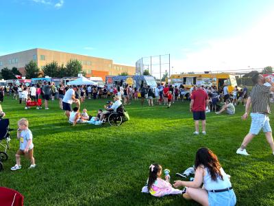 4th of July event attendees enjoying food trucks prior to the fireworks