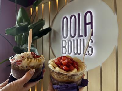two acai bowls from Oola Bowls topped with strawberries and bananas