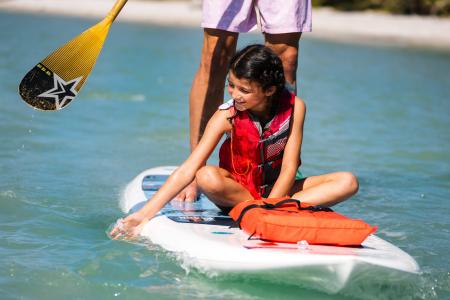 Family paddleboarding in Punta Gorda/Englewood Beach