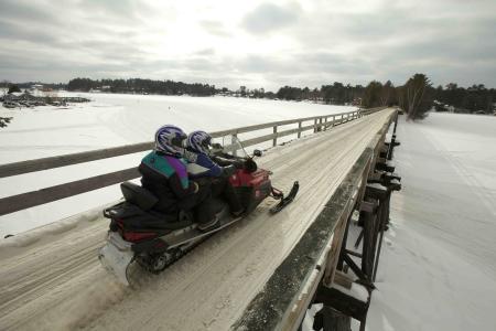 Snowmobile on bridge