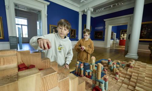 Children taking part in an activity with wooden blocks at Compton Verney Art Gallery