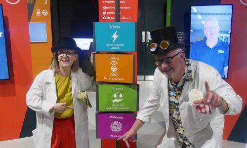 Two costumed characters dressed as scientists at the British Motor Museum