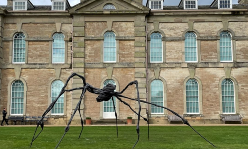 A spider sculpture in front of Compton Verney