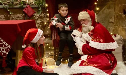 Children meeting Santa at St Mary's Guildhall