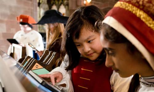 Children in Medieval costume at St Mary's Guildhall