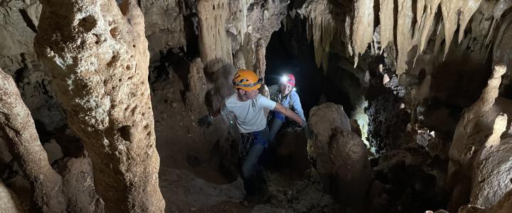 Two young teens take the brand new St. Mary's Adventure Tour at Natural Bridge Caverns in July 2022.