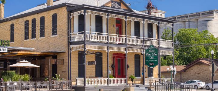 The historic Comal hotel structure was planned in 1897 and built in 1898-1990 by New Braunfels builder Christian Herry, after the site had been cleared by removal of the dwelling built by Joseph Klein. The hotel was situated on the corner of East San Antonio and Market Streets. The hotel was built by Emilie Kuse Eggeling on property owned by her parents, Mr. and Mrs. William Kuse.