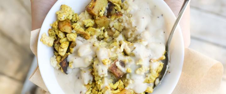 Skull and Cakebones’ breakfast bowl with biscuits, house tofu scramble, potato hash, and a peppered gravy. Photo courtesy Skull and Cakebones