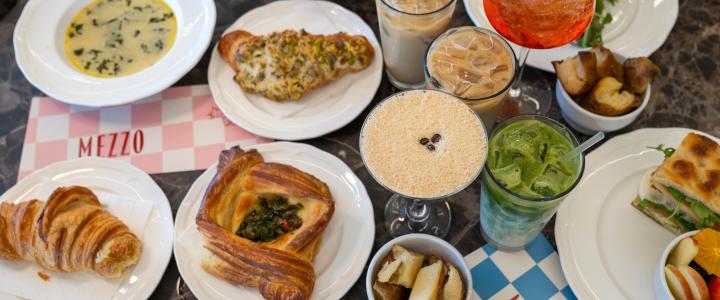 A display of food and drink on a table at Mezzo Bakeshop.