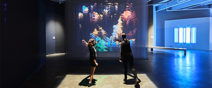 Two people exploring an interactive exhibit at Oklahoma Contemporary Arts Center