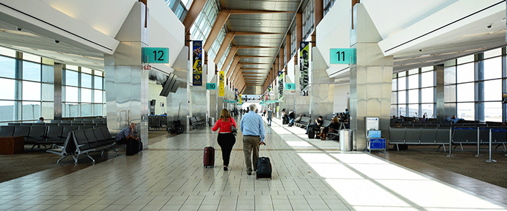 Travelers inside Will Rogers World Airport