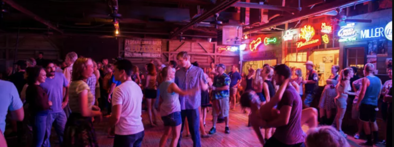 People dance at Gruene Hall. Photo credit Southern Living.