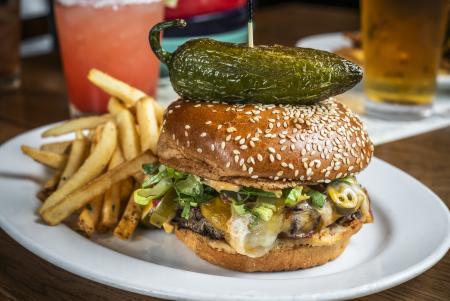 Cheesy Jalapeno Burger and fries from Rusty Bucket