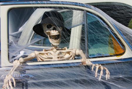 Skelton in a car