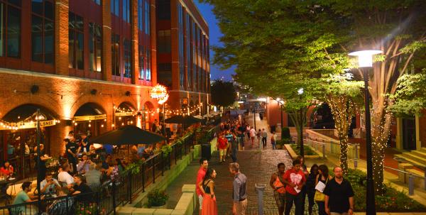 Lights dazzle at night in the Arena District of Columbus, Ohio.