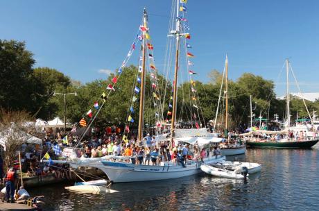 Boats line the Tchefuncte River for the Wooden Boat Festival in Madisonville