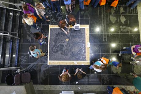 visitors work together on large art projects at Imagine RIT