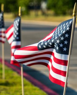 Picture of three American Flags Flowing in the Wind