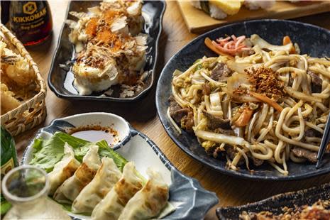 Top shot of noodles, gyozas and dumpling at Sakura