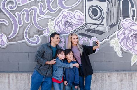 Family at Mural in the Rail District