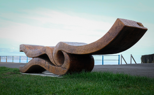 Time and Tide a sculptural bench made from a single huge slab of oak