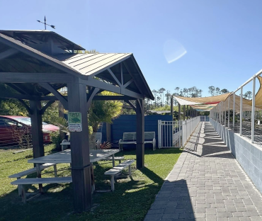 Covered picnic table at IguanaLand, the world's largest reptile zoo, in Punta Gorda, Florida