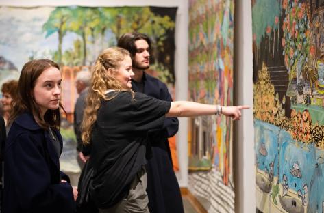 Visitors explore one of the exhibitions on view.