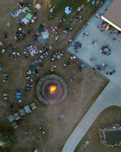 An aerial View of firepit friday at Ommegang