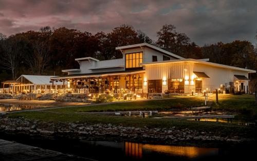 550 Waterfront at night with lights on the back patio
